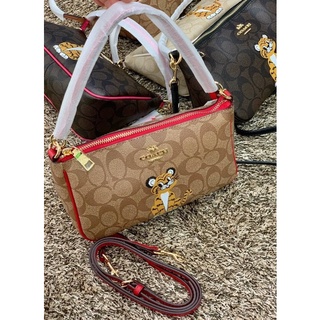 COACH TOP HANDLE POUCH SIGNATURE WITH BABY TIGER PRINT