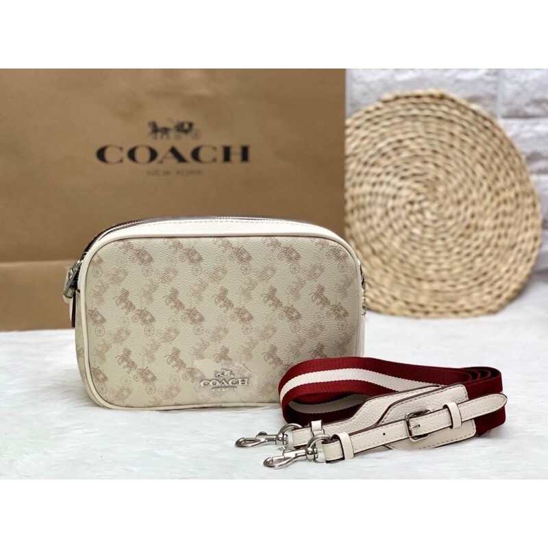 coach-jes-crossbody-with-horse-and-carriage-print