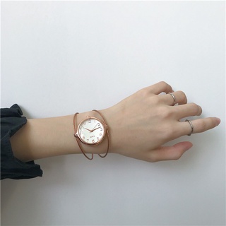 สุภาพสตรีสายบางสร้อยข้อมือนาฬิกา Creative Hollow นาฬิกาควอตซ์ประณีตรอบแฟชั่นผู้หญิงนาฬิกาบูติกของขวัญนาฬิกา