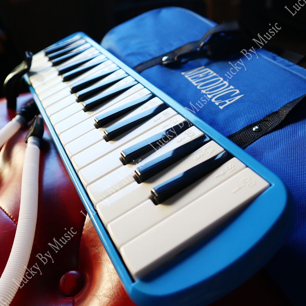 เมโลเดี้ยน-melodica-จำนวน-32-คีย์-สีฟ้า-ขนาดมาตรฐาน-เสียงดี-ไม่กินลม-เหมาะสำหรับเด็ก-พร้อมสายเป่าเมโลเดี้ยน