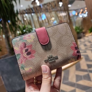 COACH MEDIUM CORNER ZIP WALLET IN SIGNATURE CANVAS WITH PRINTS