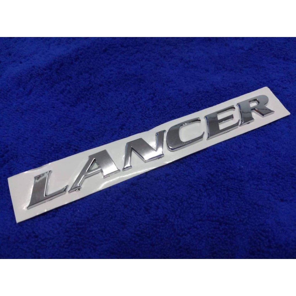 โลโก้ตัวหนังสือ-lancer-สี-ชุบ-ราคา-ต่อชิ้น