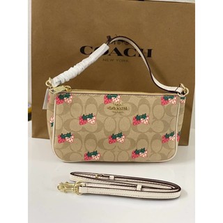 Coach Messico Top Handle Pouch In Signature Coated Canvas