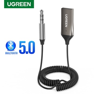 ภาพหน้าปกสินค้าUGREEN ตัวรับสัญญาณบลูทูธ 5.0 แปลงจาก USB เป็น แจ็ก 3.5 มม. มีไมค์ สำหรับลำโพงรถยนต์ ที่เกี่ยวข้อง