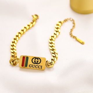 Gucci สร้อยข้อมือลําลอง กําไลข้อมือ กลวง โลโก้ตัวอักษร GG คู่ สร้อยข้อมือเหล็กไทเทเนียม