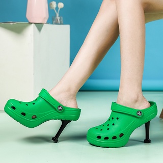 ภาพหน้าปกสินค้าใหม่ trendingCrocs Edition Madame รองเท้าส้นสูง สีดํา เขียว ขาว แดง สําหรับผู้หญิง eu36-41 ที่เกี่ยวข้อง