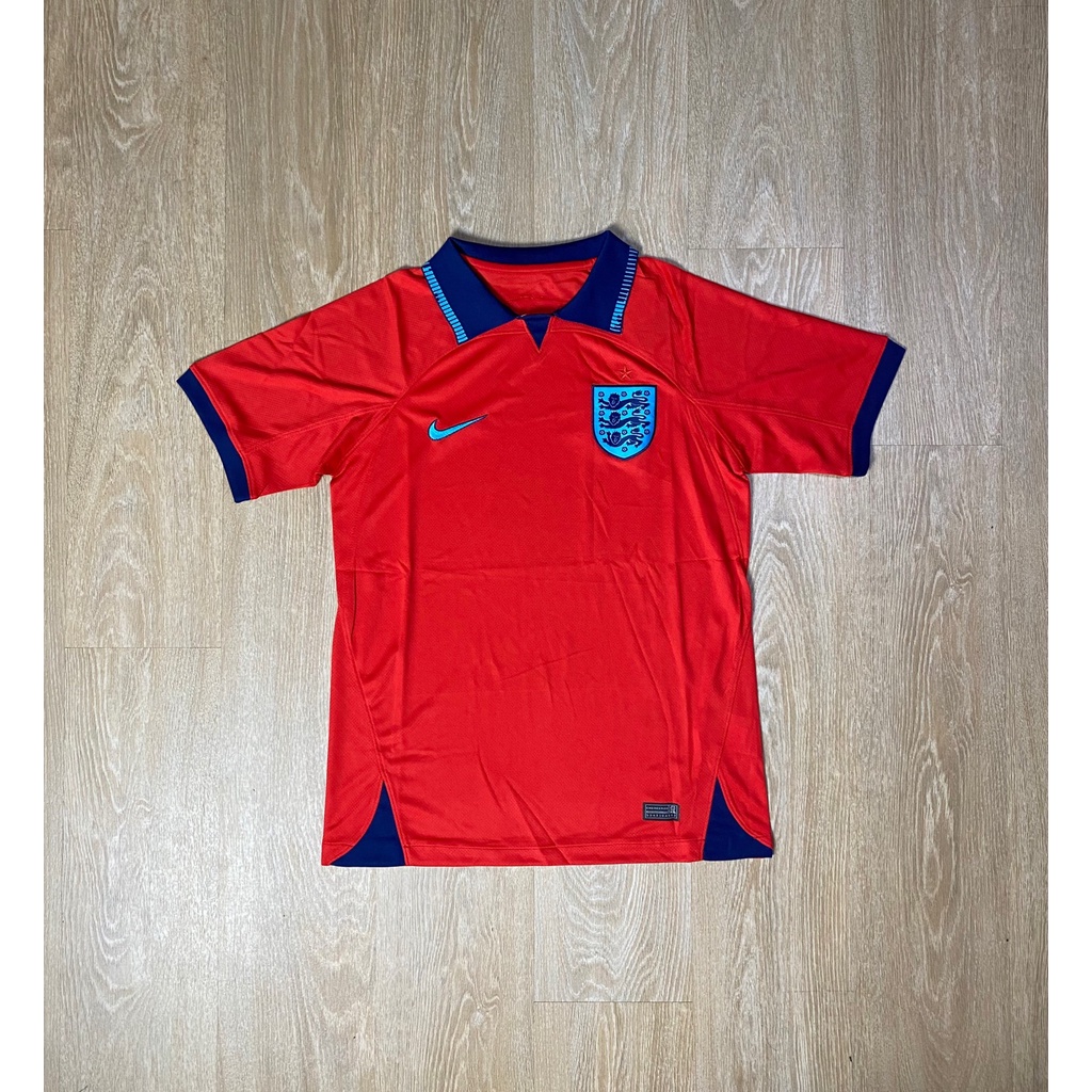 เสื้อทีมชาติอังกฤษ-เยือน-แดง-22-23