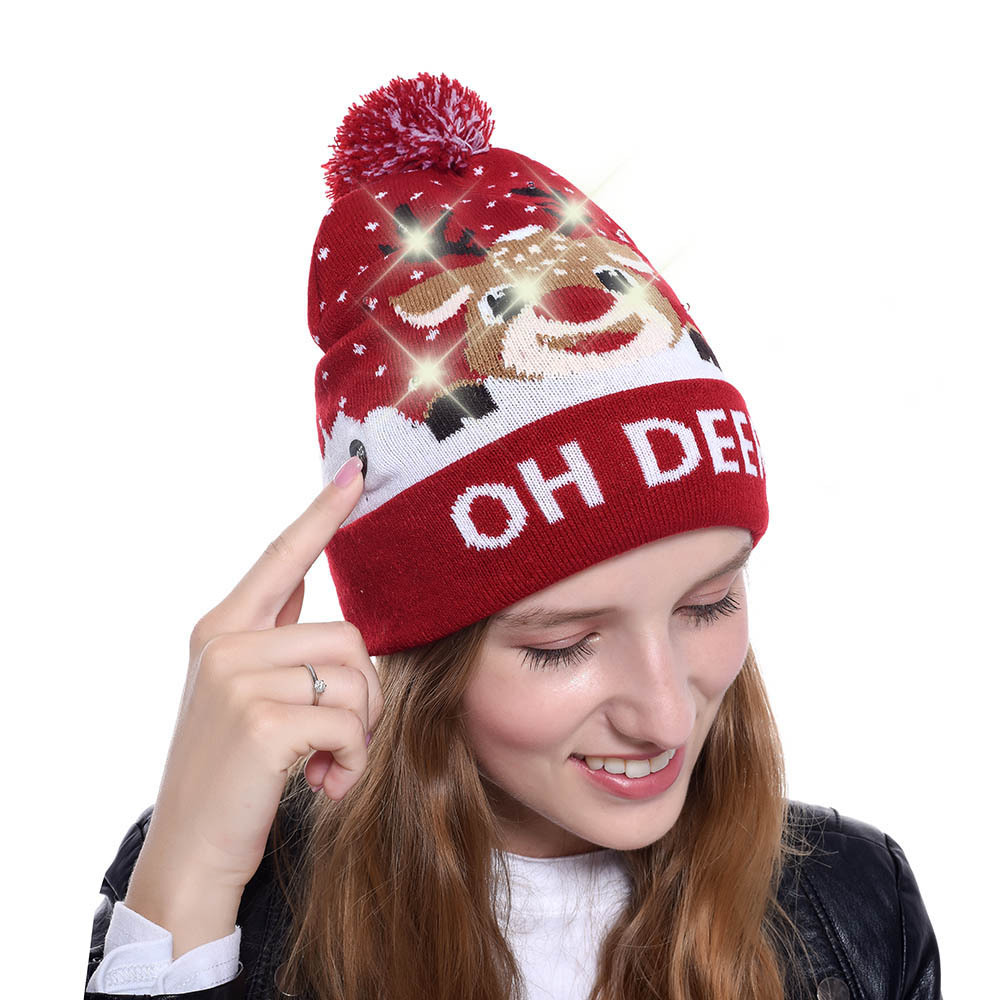 ภาพหน้าปกสินค้าChristmas element jacquard hat, Christmas accessories, gift hat, outdoor sports hat with LED luminous knitted hat, female hat จากร้าน ytbabyshop.th บน Shopee