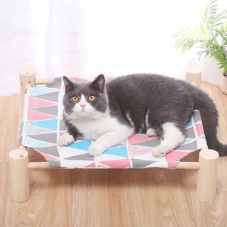 ภาพขนาดย่อของภาพหน้าปกสินค้ามีลายใหม่ เตียงนอนไม้สำหรับสัตว์เลี้ยง ที่นอนแมว ที่นอนสัตว์เลี้ยง เบาะนอนสัตว์เลี้ยง เปลแมว เตียงแมว ครบชุดไม้+ผ้า จากร้าน pandastoreth บน Shopee ภาพที่ 1