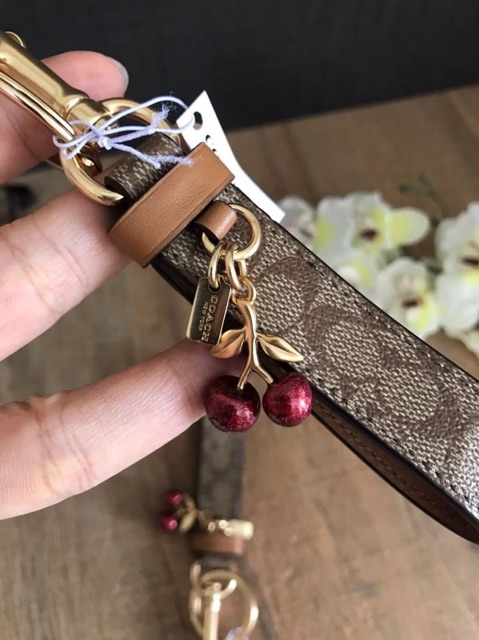 US and Japan Online - COACH Signature Charm Loop Bag Charm KHAKI/GOLD STYLE  NO. F32670 ราคา PRODUCT DETAILS - Signature coated canvas and refined calf  leather - Attached split key ring and