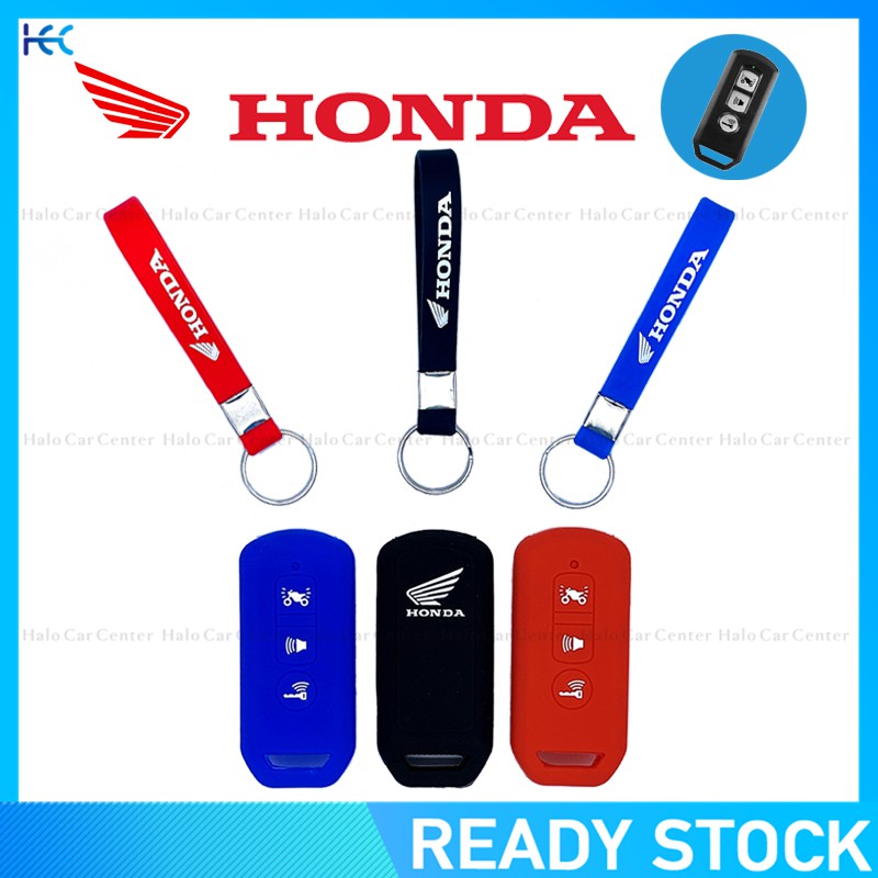 ภาพหน้าปกสินค้าพร้อมส่งเคสกุญแจรีโมทซิลิโคนสําหรับ Honda Scooter Pcx 125 150 Ns110R Adv150 พร้อมพวงกุญแจ จากร้าน halocar.th บน Shopee