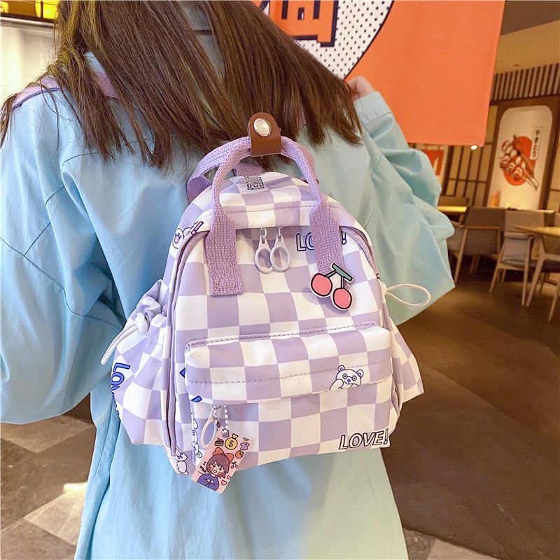 ภาพหน้าปกสินค้ากระเป๋าเป้ญี่ปุ่นกันน้ำ กระเป๋าเป้ใบเล็กสุดน่ารักกระเป๋านักเรียนอินเทรนด์ของนักศึกษาเบามาก กระเป๋าเป้ของสาวๆ