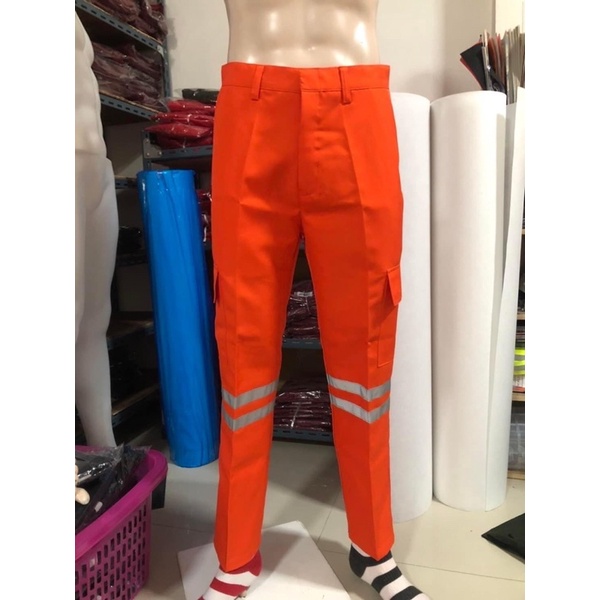 ภาพหน้าปกสินค้ากางเกงกู้ชีพกู้ภัย กางเกงช่างติดแถบสะท้อนแสง สีส้ม ผ้าลีวาย จากร้าน tonpalm_chitchanok บน Shopee
