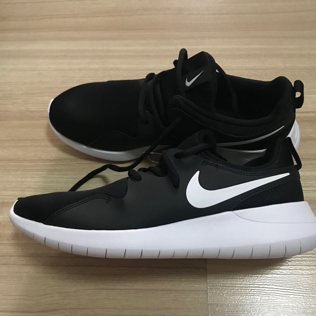 white and blue air force 1 low