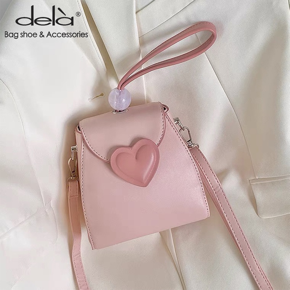 ภาพหน้าปกสินค้าDela กระเป๋าใส่โทรศัพท์มือถือ ขนาดเล็ก สีชมพู เหมาะกับของขวัญวันวาเลนไทน์ สําหรับผู้หญิง