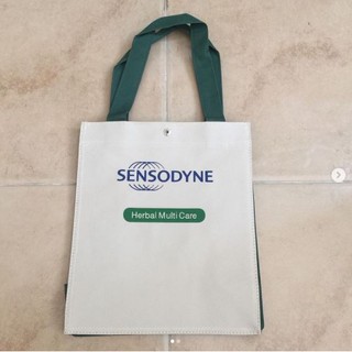 กระเป๋าผ้า กระเป๋าถือ SENSODYNE เนื้อผ้าดีมาก คุณภาพดี แนะนำ สีครีม ของใหม่ มือ 1 ขนาดดีมาก ใหม่เอี่ยม