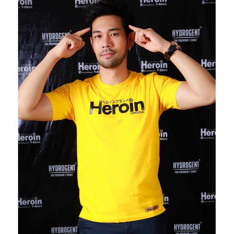 ภาพหน้าปกสินค้าHeroin เสื้อยืดสีเหลือง รุ่นออริจินัล Original ลายซิกเนเจอร์ของแบรนด์ จากร้าน heroinbrand.official บน Shopee