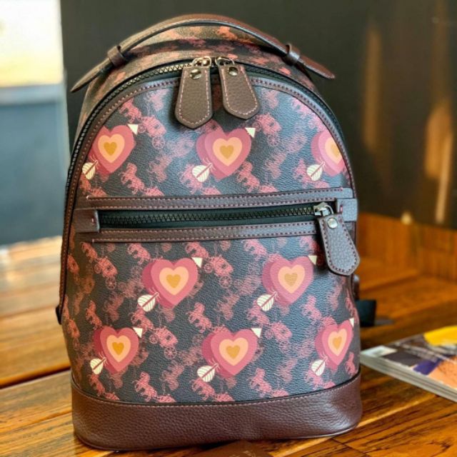 กระเป๋าเป้-coach-backpack-with-horse-and-carriage-print-and-hearts