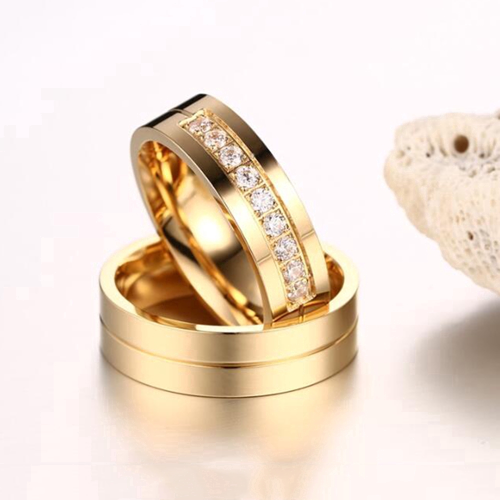 ภาพหน้าปกสินค้าCharm Men Women Fashion Diamond Crystal Silver Gold Titanium Wedding Engagement Couple Rings จากร้าน a_mango.th บน Shopee