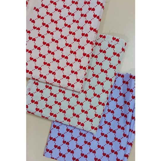 ภาพหน้าปกสินค้าผ้าเมตร ผ้าหลา ผ้าคอตต้อนทีซี ลายหัวใจเล็ก หน้ากว้าง 45 นิ้ว จากร้าน pkfabric บน Shopee