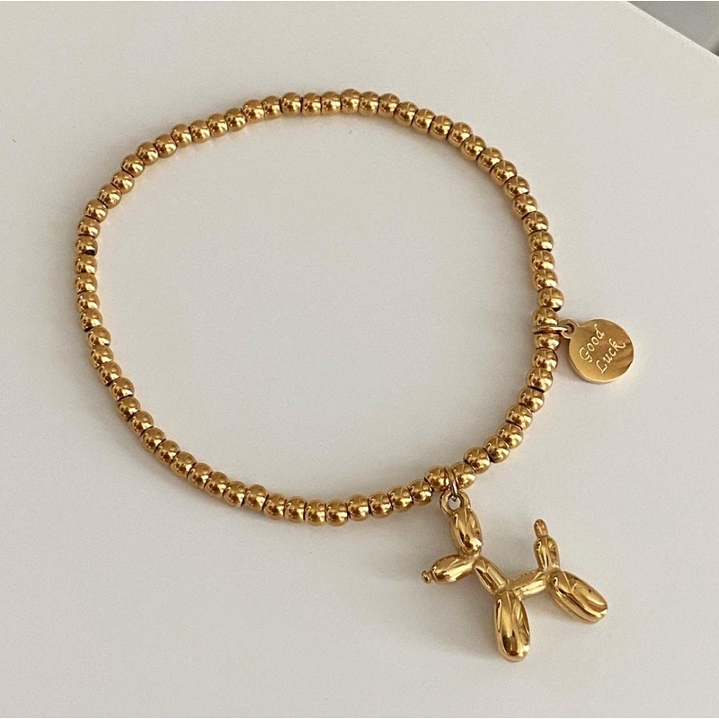 ภาพหน้าปกสินค้าimean.store - Poodle bracelet with 18k gold   ข้อมือห้อยจี้พุดเดิ้ล (สามารถยืดได้)