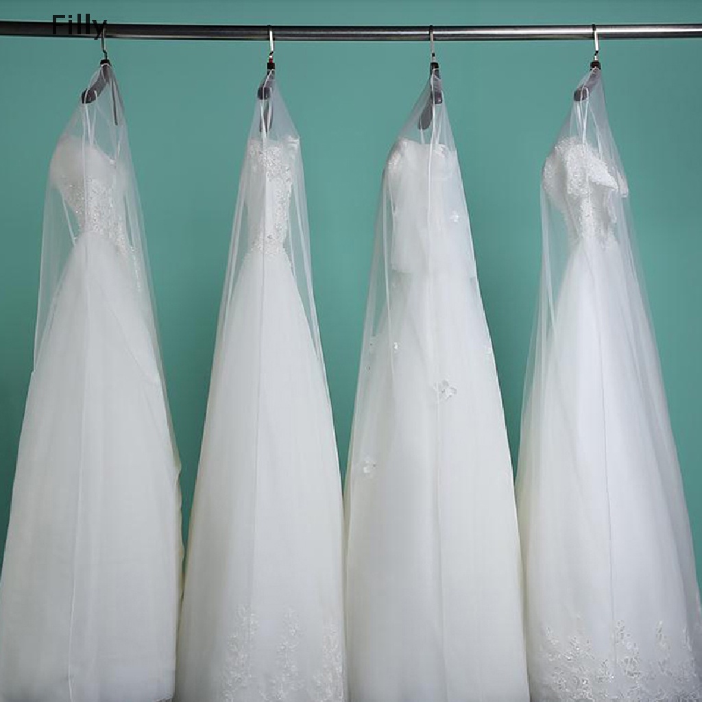 ภาพหน้าปกสินค้าผ้าคลุมชุดแต่งงานแบบใสกันฝุ่น Iouq จากร้าน filly.th บน Shopee