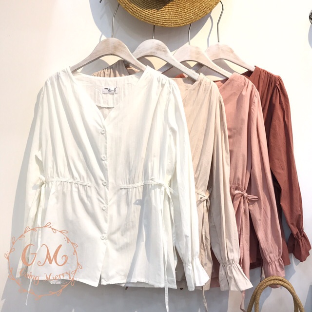 เสื้อคอวีผ่าหน้าติดกระดุม