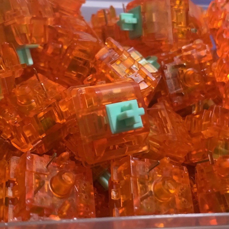 ภาพหน้าปกสินค้าC Tangerine Switch (x1) สวิทช์ Linear สีส้มเขียวสำหรับ Mechanical Keyboard ผลิตโดย JWK (Durock) จากร้าน parkemech บน Shopee