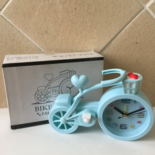 นาฬิกาตั้งโต๊ะ นาฬิกา สีฟ้า ดีไซน์เป็น ลายจักรยาน ช่วยเพิ่มความน่ารัก มือ 1 ของใหม่ ใครได้ไปต้องชอบ เป็นของขวัญ