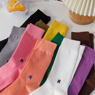 ภาพหน้าปกสินค้าKAFU D564ถุงเท้าขายาวสีพื้นทรงหลวมพิมพ์ลายตัวอักษรสีลูกกวาด ที่เกี่ยวข้อง