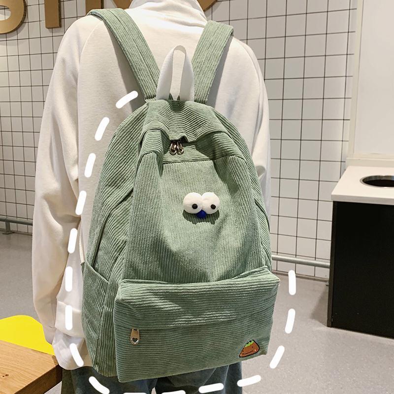 ภาพหน้าปกสินค้าCanvas backpack Laptop Bag large capacity school bag Korean Student solid color corduroy จากร้าน danea.th บน Shopee