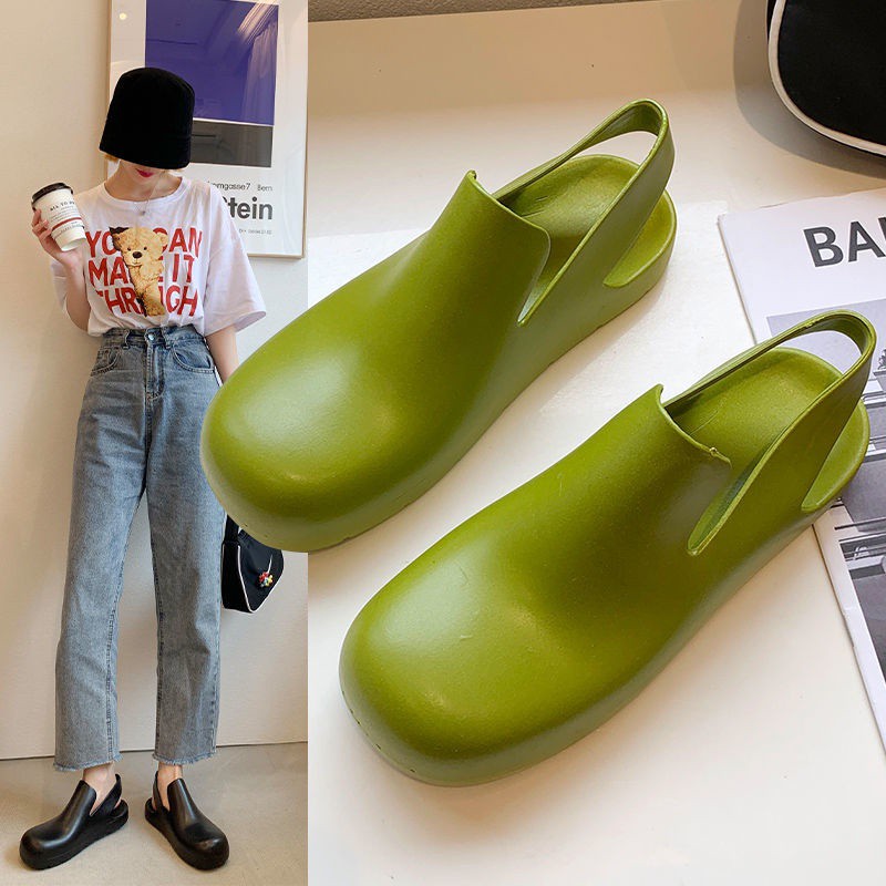 ภาพหน้าปกสินค้าClearance พิเศษ Jelly รองเท้า 2021 Xia Axige เดียวกันหนารองเท้าฝนพลาสติก Baotou รองเท้าแตะขี้เกียจรอ จากร้าน 77kjm_npnm บน Shopee