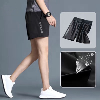 ภาพหน้าปกสินค้าM-5XL กางเกงขาสั้น Men\'s Casual Sports Shorts Men Quick-drying Gym Running Fitness Short Pants ซึ่งคุณอาจชอบราคาและรีวิวของสินค้านี้