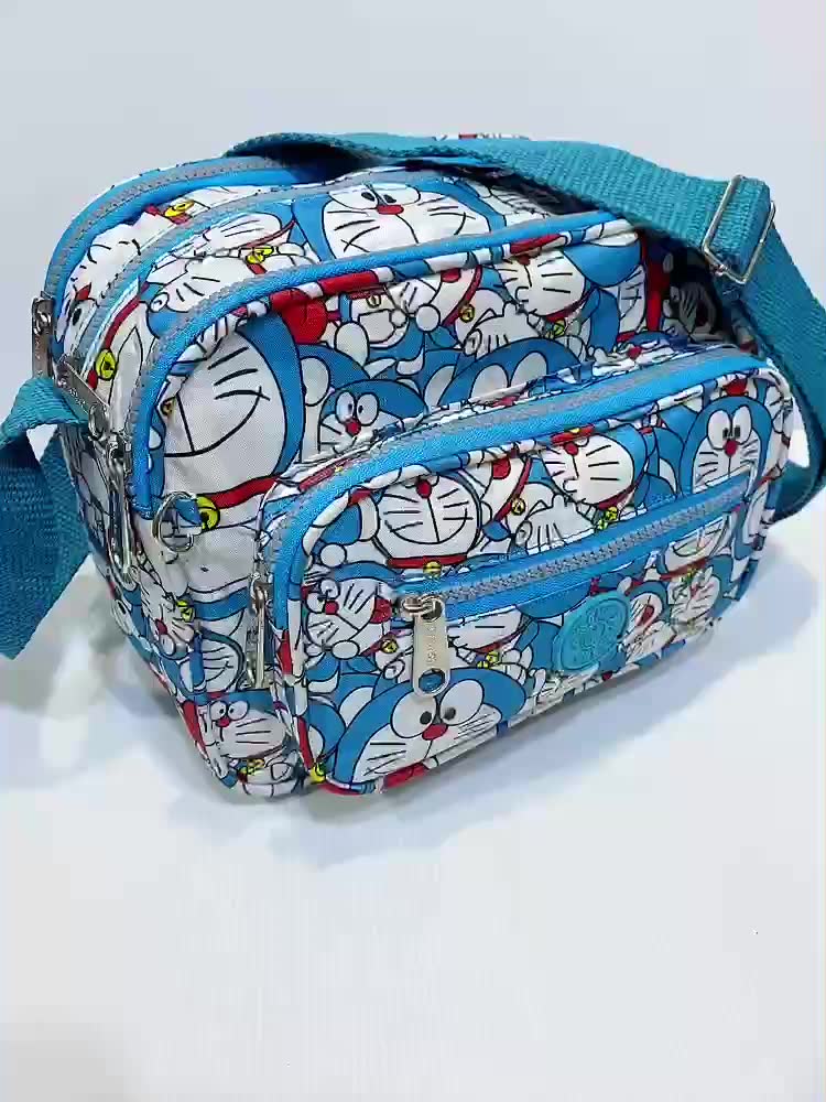 doraemon-kitty-สีพื้น-รุ่นมาใหม่2023-กระเป๋าสะพายข้างขนาด-10-นิ้ว