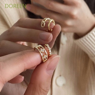 สินค้า Doreen ต่างหูแบบคลิปหนีบหูรูปดาวสีทองสไตล์เกาหลี 2 ชิ้น / ชุด