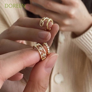 Doreen ต่างหูแบบคลิปหนีบหูรูปดาวสีทองสไตล์เกาหลี 2 ชิ้น / ชุด