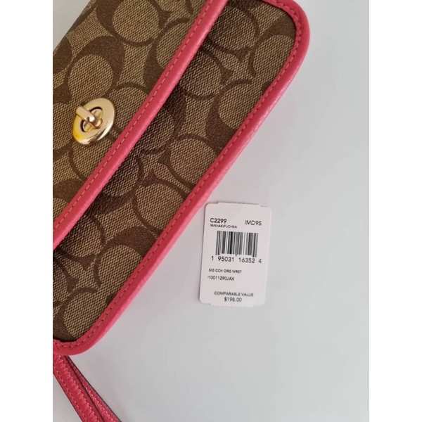 กระเป๋าคล้องมือ-coach-originals-wristlet-in-signature-canvas-coach-c2299-im-khaki-fuchsia-ลายซีสีน้ำตาล-สายสีชมพู