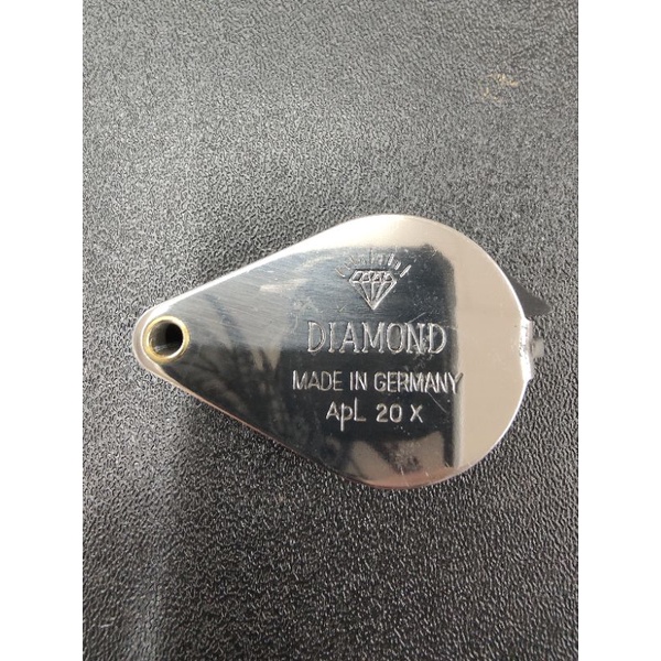 ภาพหน้าปกสินค้ากล้องส่องพระ สแตนเลส DIAMOND MADE IN GERMANY APL 20X จากร้าน eakkasit09 บน Shopee