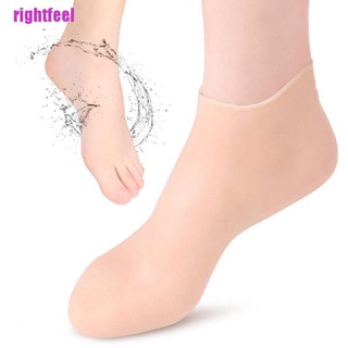 ภาพหน้าปกสินค้าRightfeel ถุงเท้าซิลิโคนเจลให้ความชุ่มชื้นป้องกันการแตก 1 คู่ ที่เกี่ยวข้อง