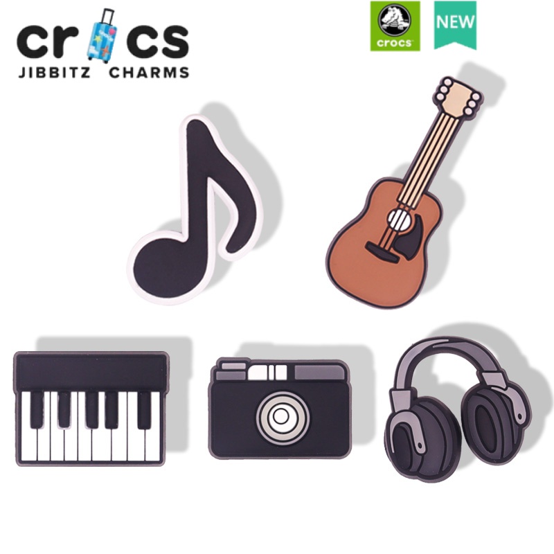 ภาพหน้าปกสินค้าjibbitz crocs charms ตัวติดรองเท้า เพลง เปียโน กีตาร์ ซีรีส์ ตัวติดรองเท้า crocs เซ็ต 5 ชิ้น DIY jibbitz เครื่องประดับแฟ