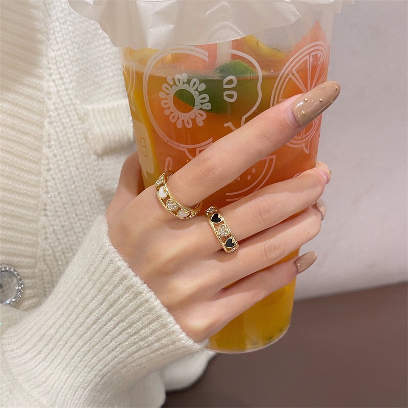ภาพหน้าปกสินค้าJinli แหวนนิ้วมือโลหะผสมประดับเพชร Rhinestone รูปหัวใจสีทองสําหรับสตรี จากร้าน jinlisotre.th บน Shopee