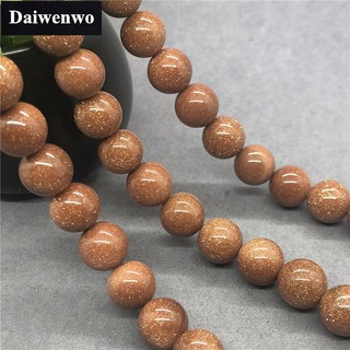 ภาพหน้าปกสินค้าGold Sand Stone Beads ทองทรายหินลูกปัดรอบ 4-12 มิลลิเมตรพลอยหลวม Spacer DIY สำหรับเครื่องประดับต่างหู ซึ่งคุณอาจชอบราคาและรีวิวของสินค้านี้