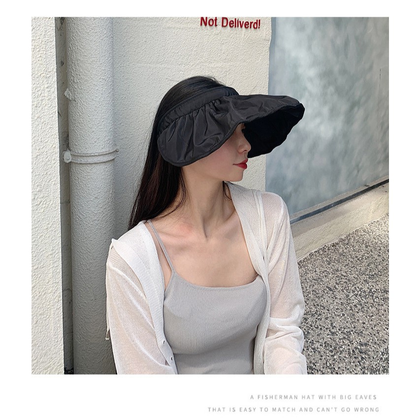 ภาพหน้าปกสินค้าหมวกเชลล์เกาหลี UV CUTหมวกแก๊ป เปิดหัว หมวกแฟชั่นผูหญิง ผู้หญิง วินเทจ กันแดด กันยูวี พับได้ รุ่นE111 สีชมพู กากี กลม ดำ จากร้าน kayleyluo บน Shopee