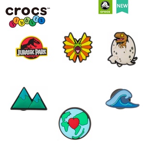 ภาพหน้าปกสินค้าCrocs/jibbitz chaims CROSS กระดุม Jurassic World อุปกรณ์เสริม สําหรับตกแต่งรองเท้า ที่เกี่ยวข้อง