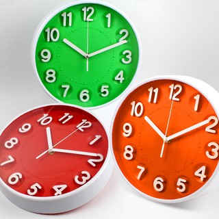 ภาพขนาดย่อของภาพหน้าปกสินค้านาฬิกาแขวน ทรงกลมตัวเลขนูน สินค้าเป็นคละสี ขนาด 10 นิ้ว Good Well Clock รุ่น Clock-194-05g-Song จากร้าน th_2444494 บน Shopee