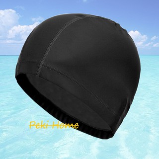 ภาพขนาดย่อของสินค้าหมวกว่ายน้ำสีดำเคลือบPU กันน้ำ ป้องกันผมเสียจากคอลลีน/น้ำทะเล ผู้ชาย ผู้หญิง