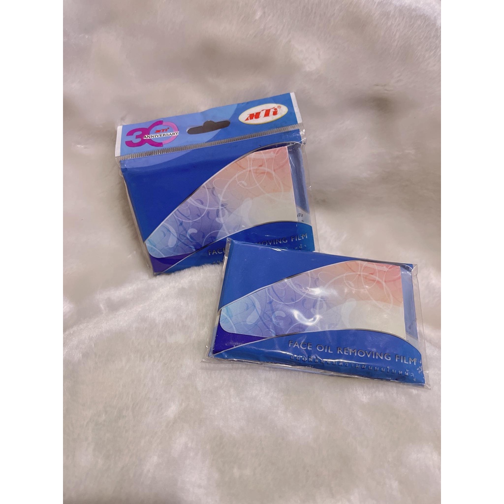 mti-face-oil-removing-film-แผ่นฟิล์มซับความมันบนใบหน้า