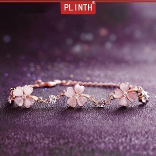 PLINTH สร้อยข้อมือเงินแท้ 925 ประดับเพชรสีชมพู ใบโคลเวอร์สี่ใบ คริสตัล