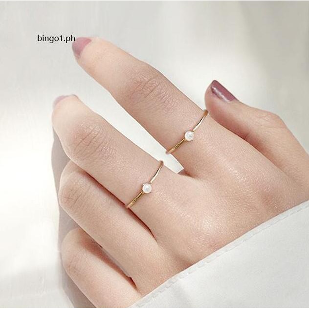 ภาพหน้าปกสินค้าแหวนมุก สีทอง ขนาดเล็ก 14k จากร้าน bingo1.th บน Shopee