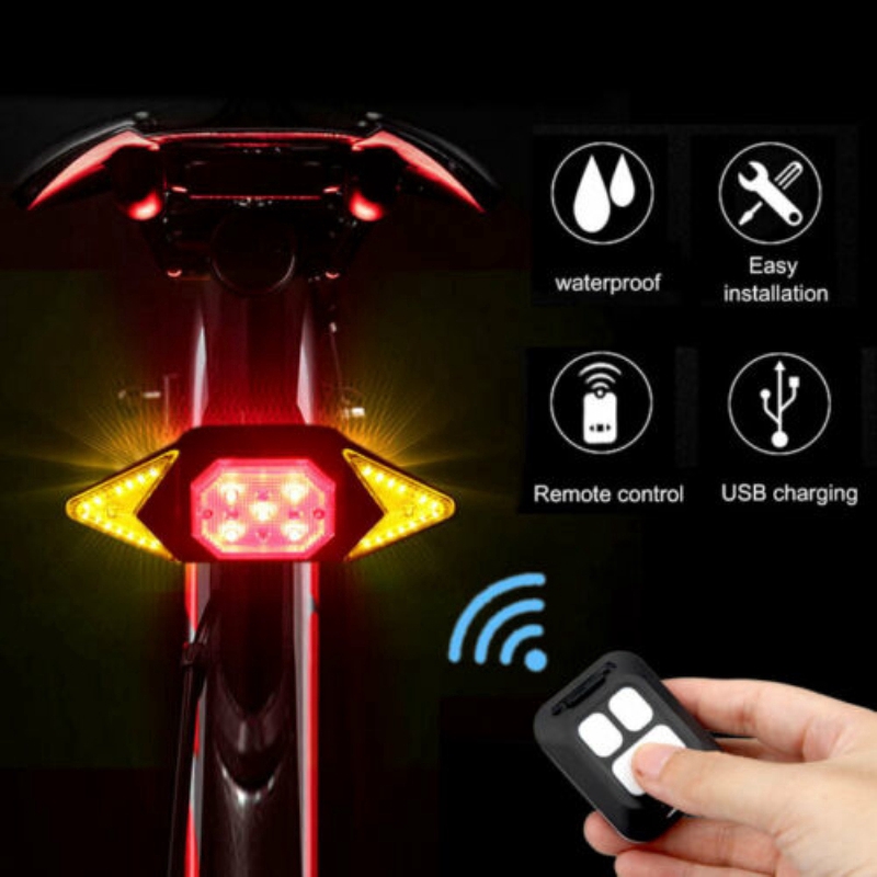 ภาพหน้าปกสินค้าไฟท้ายจักรยานอัจฉริยะ LED สัญญาณไฟเลี้ยวจักรยาน แบบชาร์จ USB พร้อมรีโมตคอนโทรล